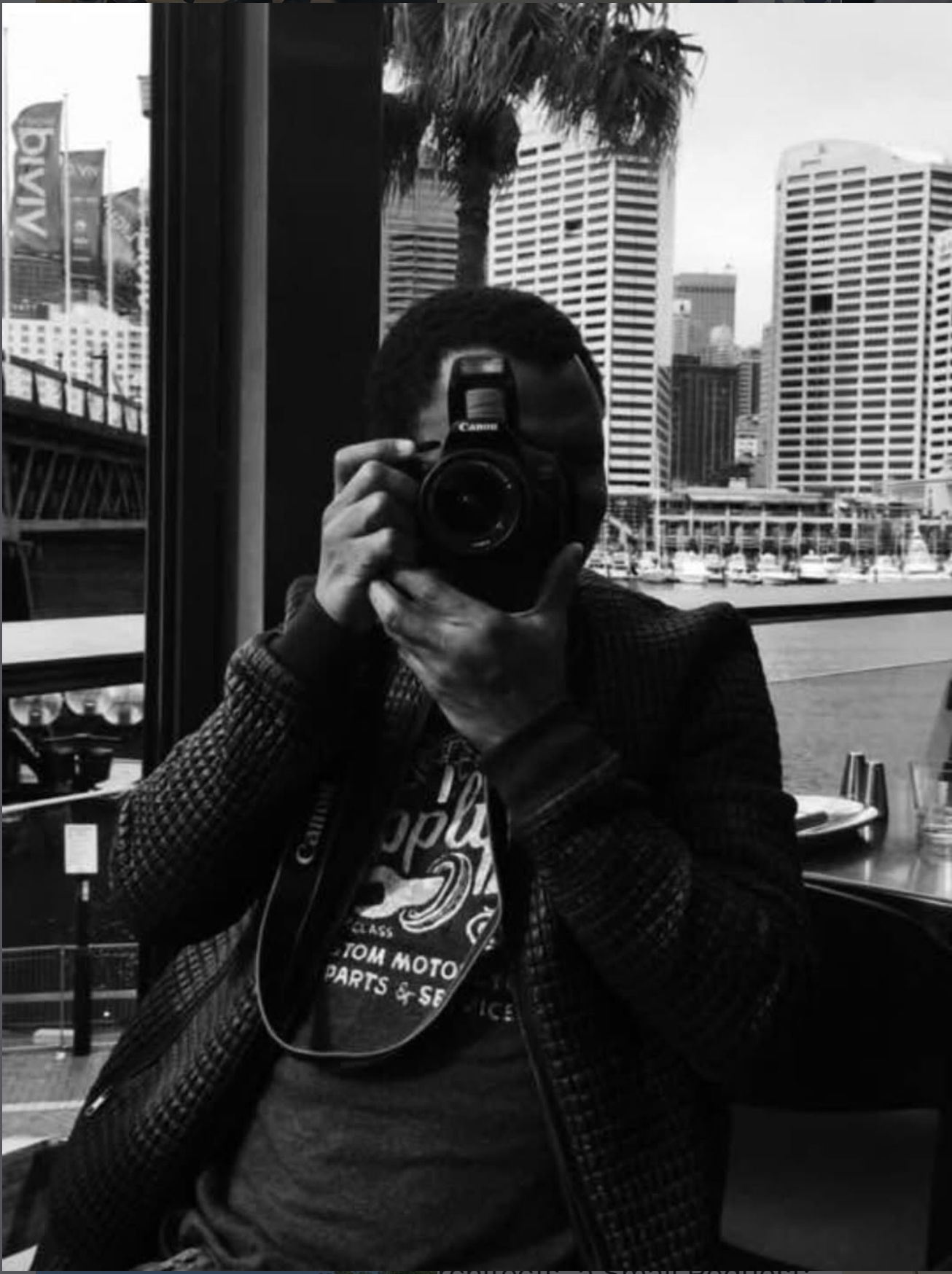 Junior Ceranor Nelson with a camera in Sydney