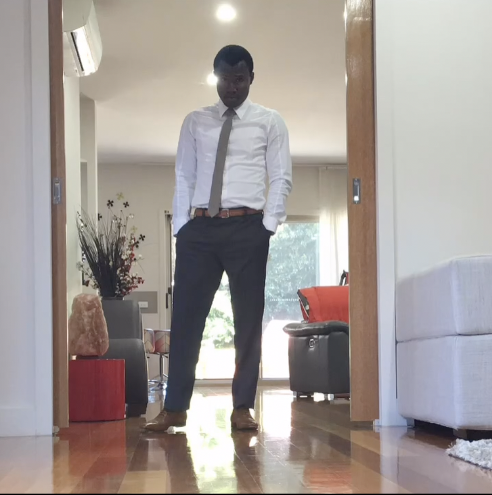 Junior Ceranor Nelson standing in a doorway, Bentleigh East, February 2018